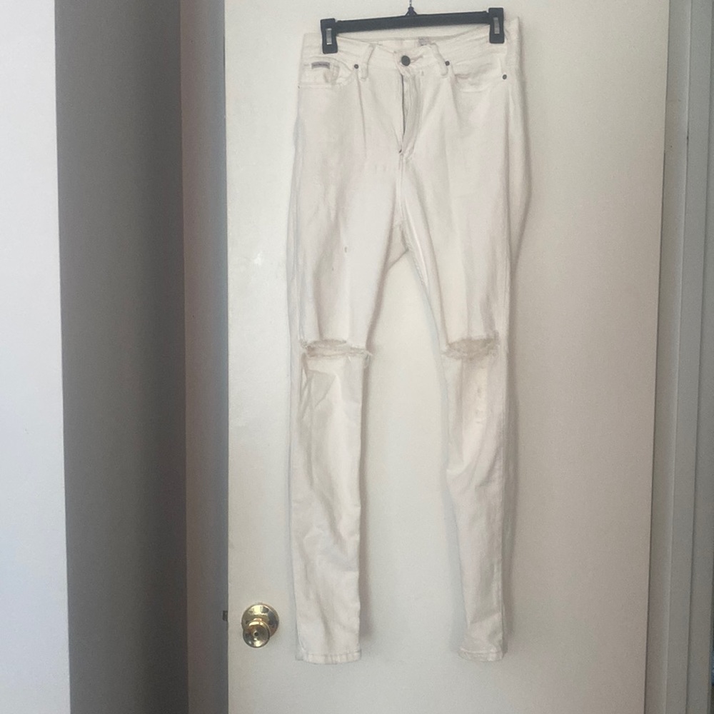 Well-Worn White Calvin Klein Ripped Jeans